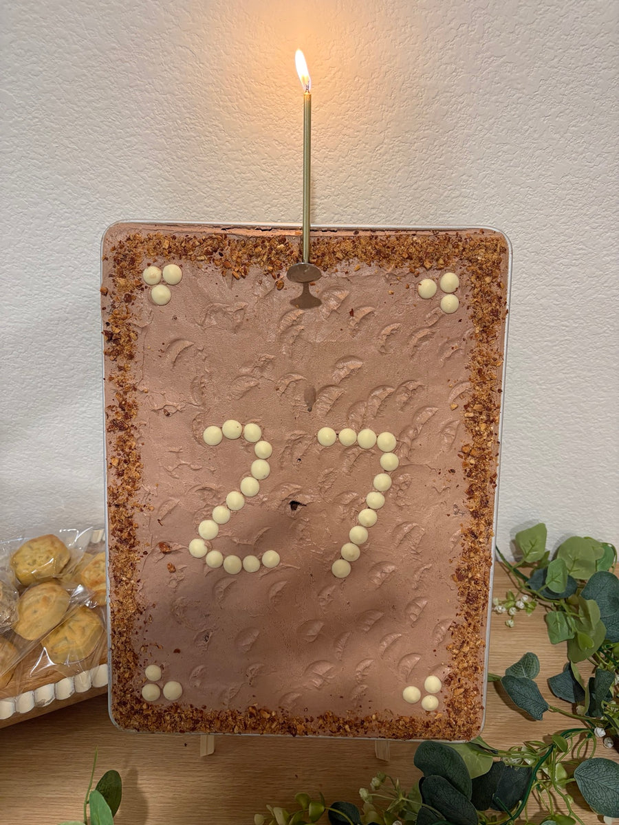 Birthday dessert display with a candle