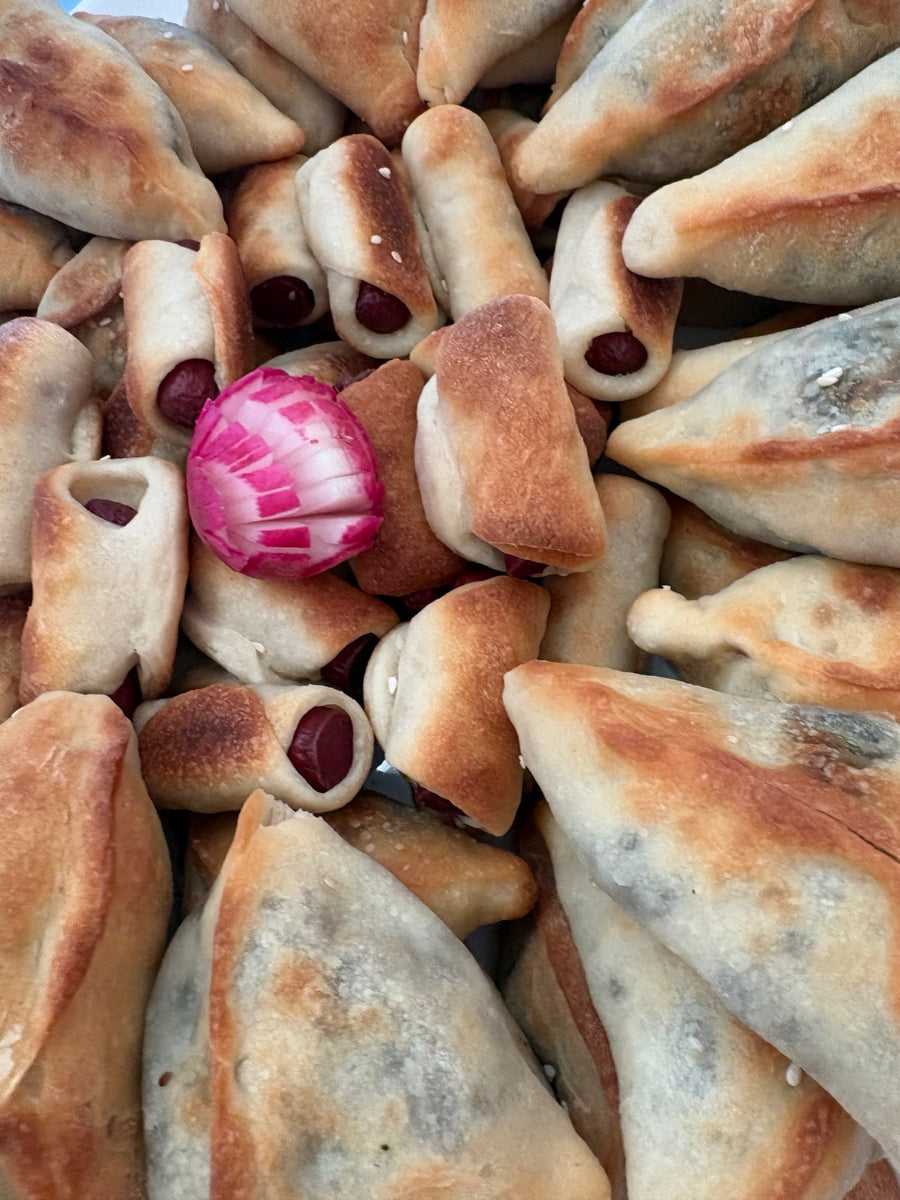 Assorted savory pastries and rolls